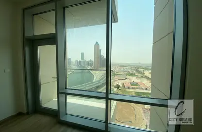 صورة لـ شرفة شقة - غرفة نوم - 2 حمامات للبيع في برج نورا - مدينة الحبتور - الخليج التجاري - دبي ، صورة رقم 1