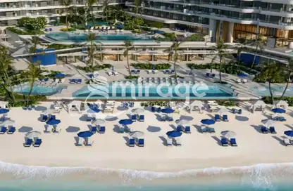 Pool image for: Apartment - 2 Bedrooms - 3 Bathrooms for sale in Nikki Beach Residences - Al Marjan Island - Ras Al Khaimah, Image 1