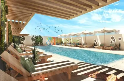 صورة لـ حوض سباحة شقة - 1 حمام للبيع في لوما 22 - قرية الجميرا سركل - دبي ، صورة رقم 1