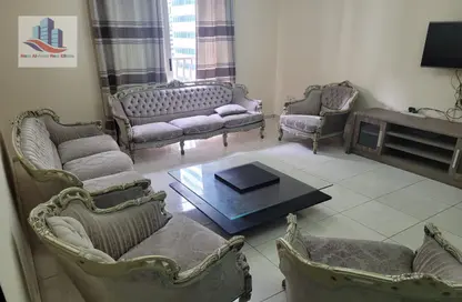 Living Room image for: Apartment - 1 Bedroom - 2 Bathrooms for rent in Al Taawoon Towers - Al Khan - Sharjah, Image 1