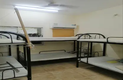 صورة لـ غرفة- غرفة النوم مجمعات للإيجار - استوديو للايجار في الجرف الصناعية 2 - الجرف الصناعية - عجمان ، صورة رقم 1