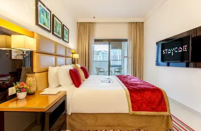 صورة لـ غرفة- غرفة النوم شقة - 1 حمام للايجار في كابيتال باي 1 - كابيتال باي - الخليج التجاري - دبي ، صورة رقم 1