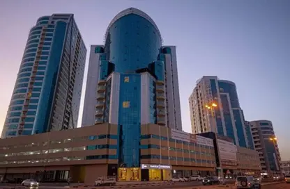 شقة - غرفة نوم - 2 حمامات للبيع في أورينت تاور 1 - أورينت تاور - البستان - عجمان