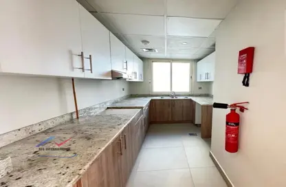 صورة لـ مطبخ شقة - غرفة نوم - 2 حمامات للايجار في دون ريزيدنسي - قرية الجميرا سركل - دبي ، صورة رقم 1
