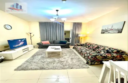 Living Room image for: Apartment - 1 Bedroom - 2 Bathrooms for rent in Al Khan Lagoon - Al Khan - Sharjah, Image 1