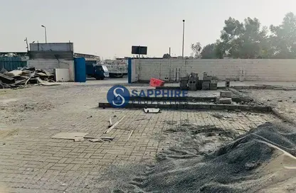 أرض - استوديو للايجار في بناية اس جي 10 - المنطقة الصناعية رقم 10 - المنطقة الصناعية بالشارقة - الشارقة