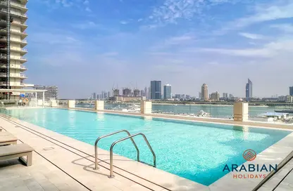 Pool image for: Apartment - 2 Bedrooms - 3 Bathrooms for rent in Marina Vista - EMAAR Beachfront - Dubai Harbour - Dubai, Image 1