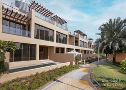 Outdoor Building image for: Townhouse - 4 bedrooms - 4 bathrooms for sale in Jumeirah Islands Townhouses - Jumeirah Islands - Dubai, Image 1