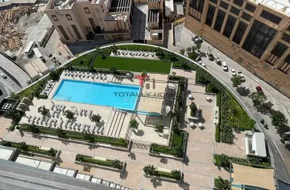 صورة لـ حوض سباحة شقة - غرفة نوم - 1 حمام للبيع في برج التاج - دبي وسط المدينة - دبي ، صورة رقم 1