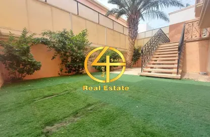 Garden image for: Villa - 6 Bedrooms for rent in Al Karamah - Abu Dhabi, Image 1