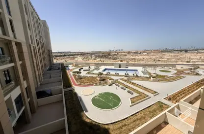 شقة - غرفة نوم - 2 حمامات للايجار في برج روكان B - برج روكان - دبي لاند - دبي