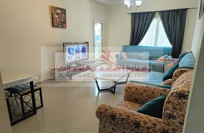 شقة - 2 غرف نوم - 2 حمامات للايجار في برج منازل 2 - شارع التعاون - التعاون - الشارقة