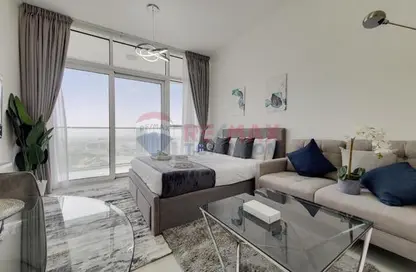 Living Room image for: Apartment - 1 Bathroom for sale in Carson - DAMAC Hills - Dubai, Image 1