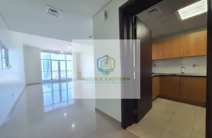 Kitchen image for: Apartment - 1 Bedroom - 2 Bathrooms for rent in Dusit Thani Complex - Al Nahyan Camp - Abu Dhabi, Image 1