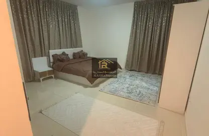 شقة - غرفة نوم - 2 حمامات للايجار في أورينت تاور 1 - أورينت تاور - البستان - عجمان