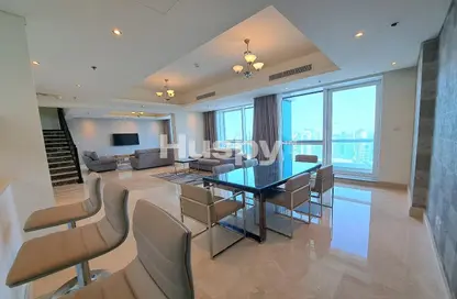 Living / Dining Room image for: Apartment - 4 Bedrooms - 6 Bathrooms for rent in Barcelo Residences - Dubai Marina - Dubai, Image 1
