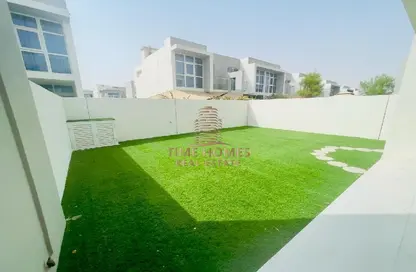 Garden image for: Townhouse - 3 Bedrooms - 3 Bathrooms for sale in Albizia - Damac Hills 2 - Dubai, Image 1