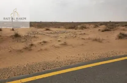 أرض - استوديو للبيع في روضة القرط - ضاحية الروضات - الشارقة