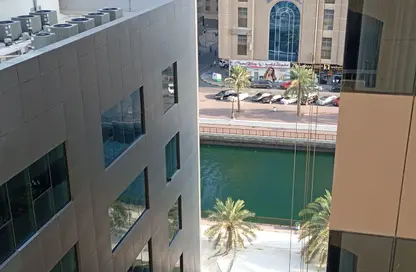 Apartment - 2 Bedrooms - 2 Bathrooms for rent in Al Shahid Tower - Al Qasba - Sharjah