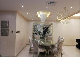 Dining Room image for: Apartment - 3 bedrooms - 4 bathrooms for sale in Asas Tower - Al Khan Lagoon - Al Khan - Sharjah, Image 1