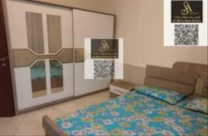 شقة - غرفة نوم - 2 حمامات للايجار في أورينت تاور 1 - أورينت تاور - البستان - عجمان