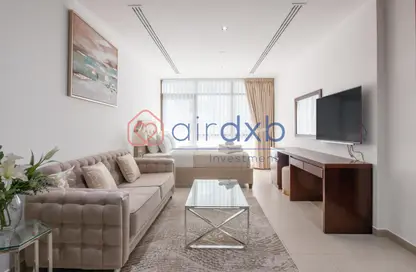 Living Room image for: Apartment - 1 Bathroom for sale in The Spirit - Dubai Sports City - Dubai, Image 1