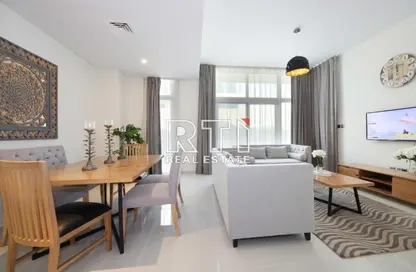 Living / Dining Room image for: Townhouse - 3 Bedrooms - 3 Bathrooms for sale in Albizia - Damac Hills 2 - Dubai, Image 1