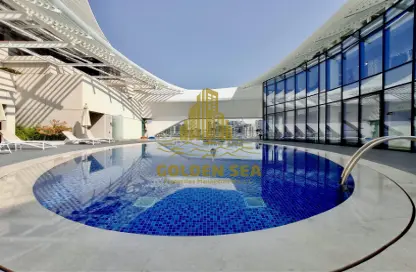 Pool image for: Apartment - 1 Bedroom - 2 Bathrooms for rent in P1410 - Al Dana - Al Raha Beach - Abu Dhabi, Image 1