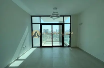 Empty Room image for: Apartment - 1 Bedroom - 2 Bathrooms for sale in Central Park Tower - Jumeirah Village Circle - Dubai, Image 1