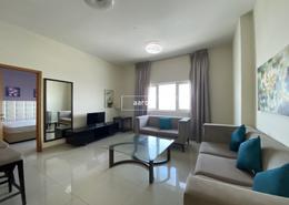 Living Room image for: Apartment - 1 bedroom - 1 bathroom for rent in Suburbia Tower 1 - Suburbia - Downtown Jebel Ali - Dubai, Image 1