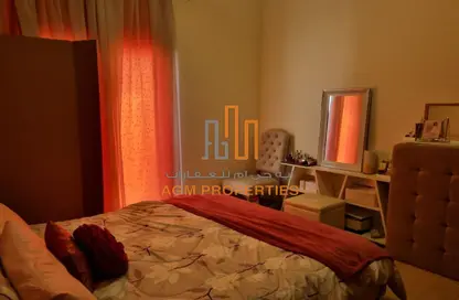 Room / Bedroom image for: Apartment - 1 Bedroom - 2 Bathrooms for rent in Al Ramth 22 - Al Ramth - Remraam - Dubai, Image 1