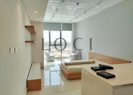 صورةغرفة المعيشة لـ: Studio - 1 حمام للبيع في برج بلو ويفز - مجمع دبي ريزيدنس - دبي, صورة 1