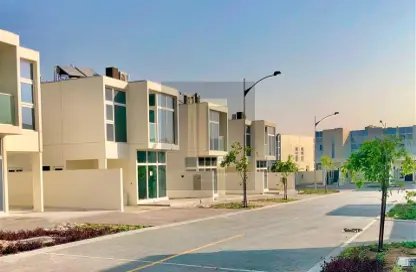 Outdoor Building image for: Apartment - 3 Bedrooms - 4 Bathrooms for rent in Aurum Villas - Sanctnary - Damac Hills 2 - Dubai, Image 1