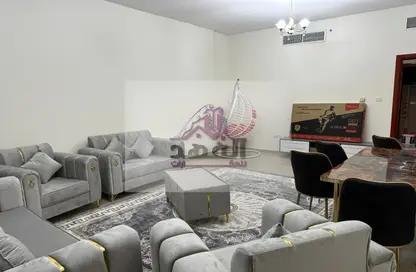 Living Room image for: Apartment - 2 Bedrooms - 2 Bathrooms for rent in Ajman Corniche Residences - Ajman Corniche Road - Ajman, Image 1