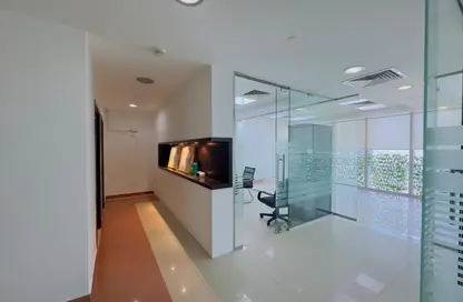 Office Space - Studio - 1 Bathroom for rent in The Prism - Business Bay - Dubai