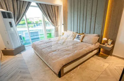 Room / Bedroom image for: Apartment - 2 Bedrooms - 3 Bathrooms for sale in La Residenza - Jumeirah Village Circle - Dubai, Image 1