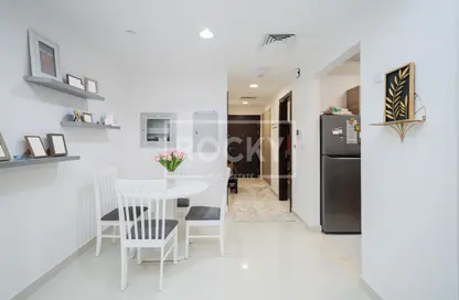 Dining Room image for: Apartment - 1 Bathroom for sale in Spanish Tower - Dubai Sports City - Dubai, Image 1