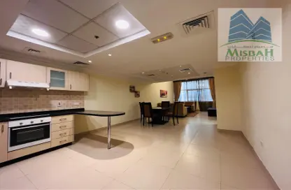 صورة لـ مطبخ شقة - غرفة نوم - 2 حمامات للايجار في برج المراد - البرشاء 1 - البرشاء - دبي ، صورة رقم 1