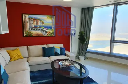 Living Room image for: Apartment - 1 Bedroom - 2 Bathrooms for rent in Sky Tower - Shams Abu Dhabi - Al Reem Island - Abu Dhabi, Image 1
