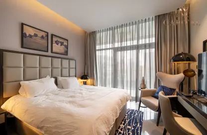 صورة لـ غرفة- غرفة النوم شقة - 1 حمام للايجار في داماك ماجستين - الخليج التجاري - دبي ، صورة رقم 1