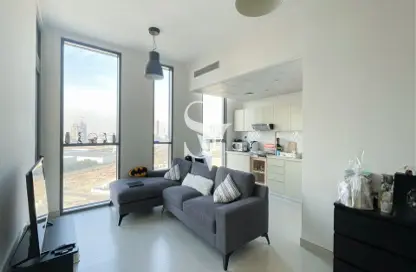 Living Room image for: Apartment - 1 Bedroom - 2 Bathrooms for sale in Afnan 1 - Midtown - Dubai Production City (IMPZ) - Dubai, Image 1