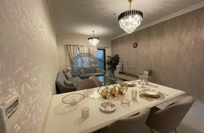 Living / Dining Room image for: Apartment - 1 Bedroom - 2 Bathrooms for sale in Al Warsan 4 - Al Warsan - Dubai, Image 1