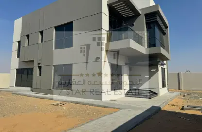 Outdoor Building image for: Villa - 4 Bedrooms - 4 Bathrooms for sale in Al Suyoh - Sharjah, Image 1