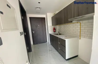 Apartment - 1 Bathroom for rent in Dubai Residence Complex - Dubai