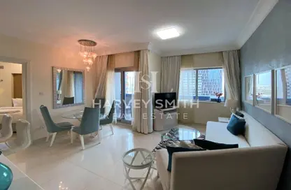 صورة لـ غرفة المعيشة / غرفة الطعام شقة - غرفة نوم - 2 حمامات للايجار في ذا سيجنتشر - برج خليفة - دبي وسط المدينة - دبي ، صورة رقم 1