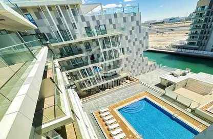 Pool image for: Apartment - 2 Bedrooms - 3 Bathrooms for rent in Al Raha Lofts - Al Raha Beach - Abu Dhabi, Image 1