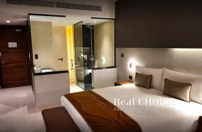 صورة لـ غرفة- غرفة النوم شقة - 1 حمام للبيع في فندق ذا ون في قرية جميرا تراينجل - مثلث قرية الجميرا - دبي ، صورة رقم 1