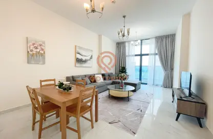 Living / Dining Room image for: Apartment - 2 Bedrooms - 3 Bathrooms for rent in Sydney Tower - Jumeirah Village Circle - Dubai, Image 1