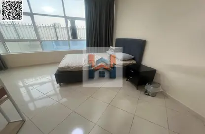 شقة - غرفة نوم - 2 حمامات للايجار في أورينت تاور 1 - أورينت تاور - البستان - عجمان
