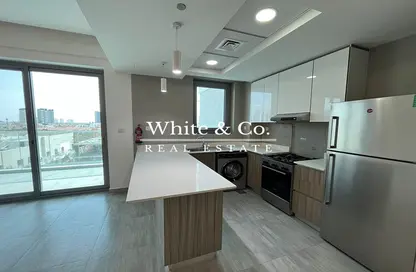 Kitchen image for: Apartment - 1 Bedroom - 2 Bathrooms for rent in Alpha Green Tower - Jumeirah Village Circle - Dubai, Image 1